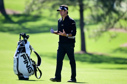 AUGUSTA, GEORGIA - APRIL 05: Bubba Watson of the United States stands near his bag on a fairway during a practice round prior to the start of the 2016 Masters Tournament at Augusta National Golf Club on April 5, 2016 in Augusta, Georgia. Harry How/Getty Images/AFP