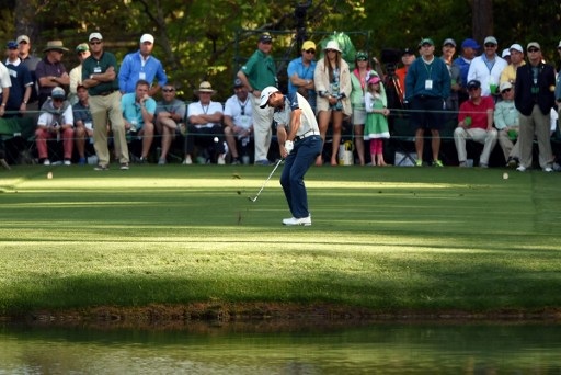 Australia's Jason Day plays a shot on the 16th hole during Round 1 of the 80th Masters Golf Tournament at the Augusta National Golf Club on April 7, 2016, in Augusta, Georgia. / AFP PHOTO / DON EMMERT