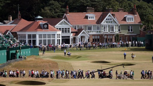 (Files) In this file picture taken on July 18, 2013, US golfer Mark O'Meara prepares to tee off on the 18th during the first round of the 2013 British Open Golf Championship at Muirfield golf course at Gullane in Scotland. Historic Scottish golf course Muirfield lost its status as a British Open venue and provoked a storm of criticism after voting not to admit female members on Thursday. A proposal to allow female members did not receive the required two-thirds majority needed, with 387 members -- or 64 percent -- voting in favour and 219 members -- or 36 percent -- voting against. / AFP PHOTO / ADRIAN DENNIS