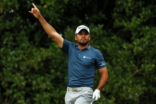 PONTE VEDRA BEACH, FL - MAY 13: Jason Day of Australia reacts to his tee shot on the 11th hole during the second round of THE PLAYERS Championship at the Stadium course at TPC Sawgrass on May 13, 2016 in Ponte Vedra Beach, Florida. Mike Ehrmann/Getty Images/AFP