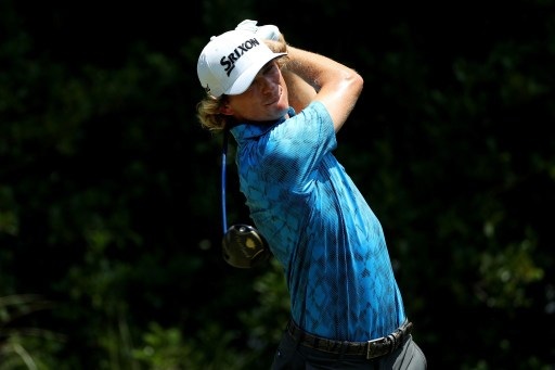 PONTE VEDRA BEACH, FL - MAY 13: Will Wilcox of the United States plays his shot from the 11th tee during the second round of THE PLAYERS Championship at the TPC Stadium course on May 13, 2016 in Ponte Vedra Beach, Florida. Scott Halleran/Getty Images/AFP