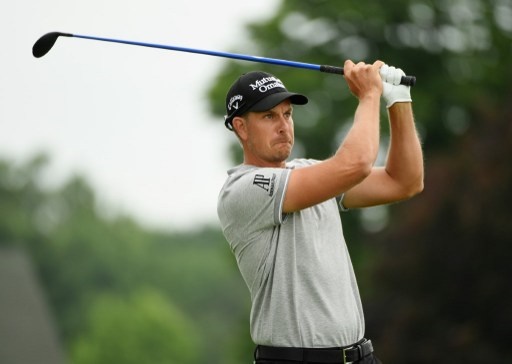 OAKMONT, PA - JUNE 17: Henrik Stenson of Sweden hits his tee shot on the tenth hole during the continuation of the weather delayed first round of the U.S. Open at Oakmont Country Club on June 17, 2016 in Oakmont, Pennsylvania. Ross Kinnaird/Getty Images/AFP