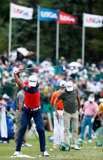 OAKMONT, PA - JUNE 15: Jason Day of Australia hits a shot on the practice range during a practice round prior to the U.S. Open at Oakmont Country Club on June 15, 2016 in Oakmont, Pennsylvania. Christian Petersen/Getty Images/AFP