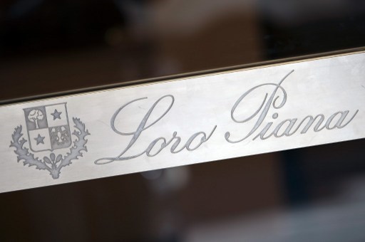 A picture taken on July 9, 2013 shows the frontage of a shop of Italian exclusive ready-to-wear fashion group Loro Piana in Paris. French luxury conglomerate LVMH will assume control of Italian Loro Piana by buying an 80 percent stake for about 2 billion euros ($2.5 billion), the company said in a statement on July 8, 2013. LVMH said that the Loro Piana family will keep the remaining 20 percent share, and that the Italian company's current directors, Sergio and Pier Luigi Loro Piana, will keep their posts. AFP PHOTO / LIONEL BONAVENTURE / AFP PHOTO / LIONEL BONAVENTURE