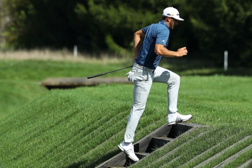 CARMEL, IN - SEPTEMBER 11: Dustin Johnson walks to the ninth green during the final round of the BMW Championship at Crooked Stick Golf Club on September 11, 2016 in Carmel, Indiana. Scott Halleran/Getty Images/AFP