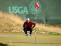 Patrick Reed studia il putt alla 17